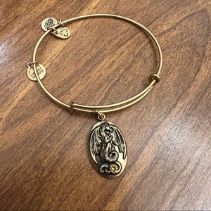 Alex and Ani gold bangle - dragon charm
